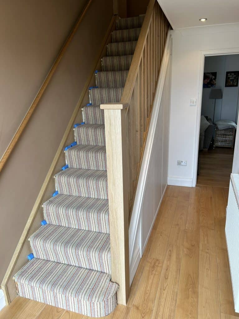 Staircase leading from the lower level.